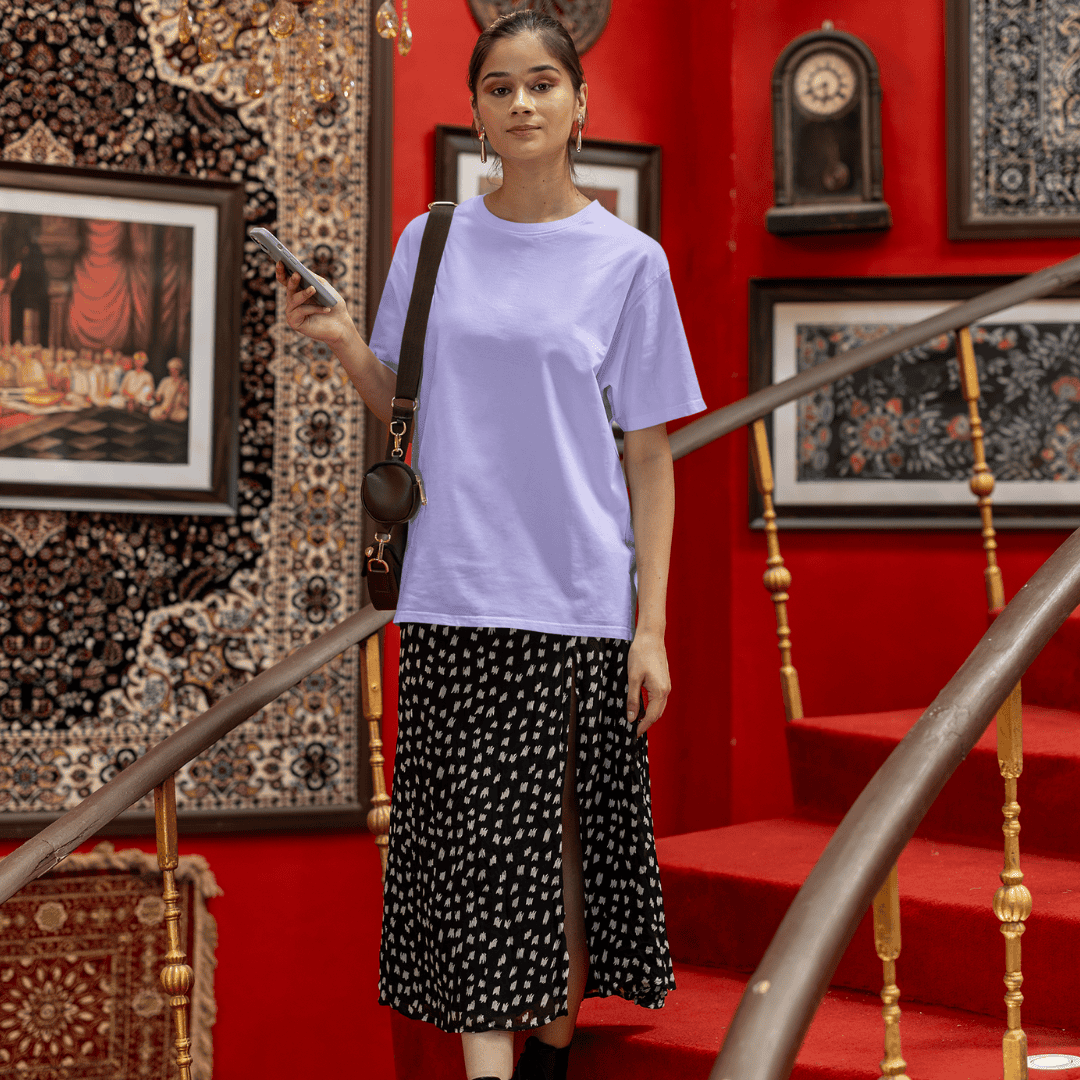 Female model wearing lavender oversized tshirt – minimal solid tshirt for men and women by Words Armor