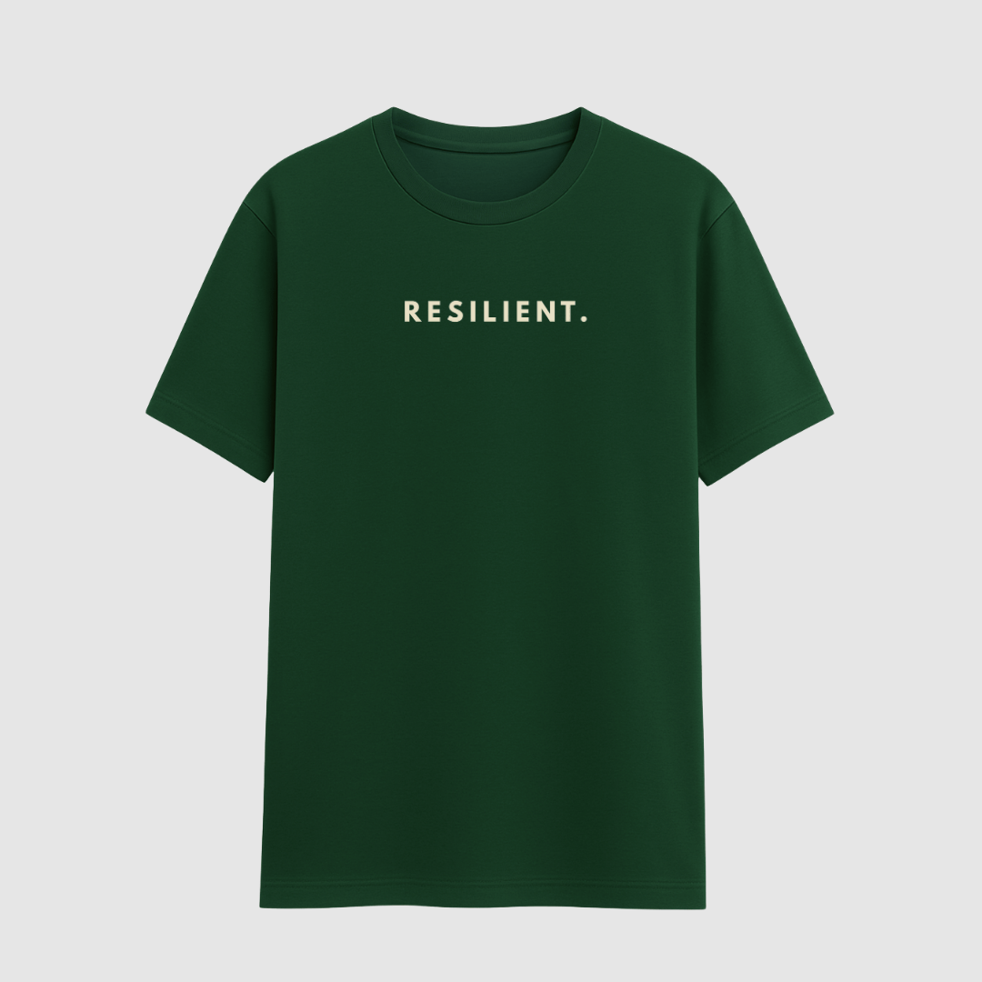 Green t-shirt with 'RESILIENT.' text on a light gray background wordsarmor