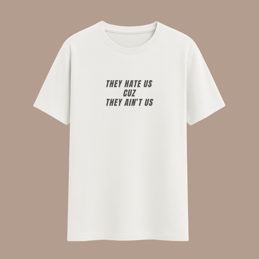 Saying white t-shirt with black text on a beige background wordsarmor