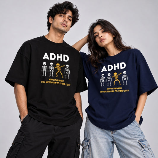 Male and female models wearing Words Armor black ADHD skeleton oversized graphic tshirts with white typography and golden-yellow print