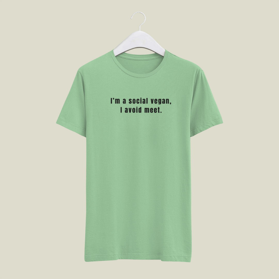 Green t-shirt with text on a beige background wordsarmor.