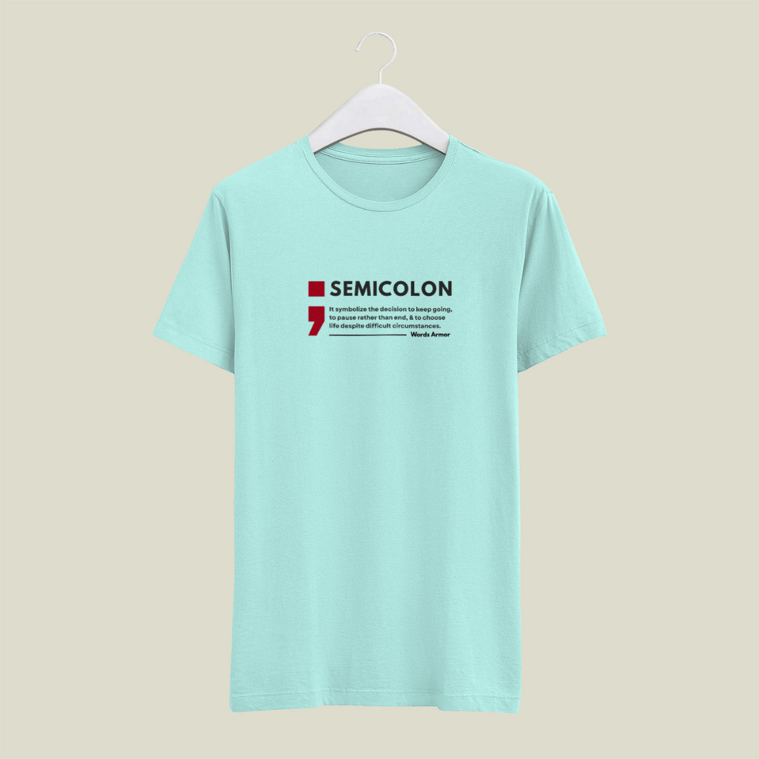 mint colour t-shirt with a semicolon graphic and text on a beige background wordsarmor
