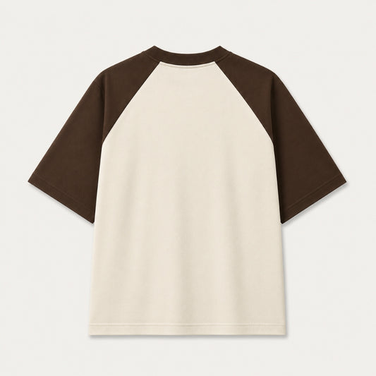 Back view of Words Armor khan Badosh Nomad Urdu oversized raglan t-shirt for men and women in coffee brown and off white made from premium 240 GSM cotton.