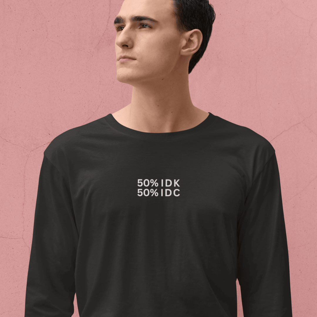 Person wearing a black long-sleeve shirt with text on a pink background wordsarmor
