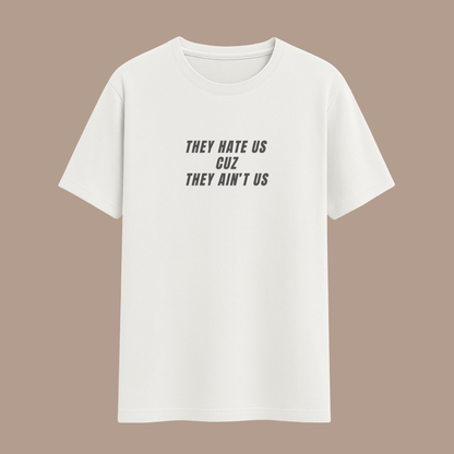 Saying white t-shirt with black text on a beige background wordsarmor