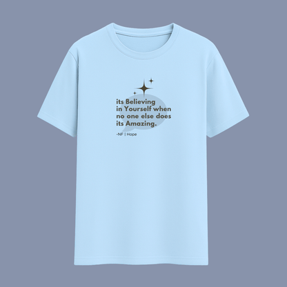 Light blue t-shirt with motivational quote on a solid background wordsarmor