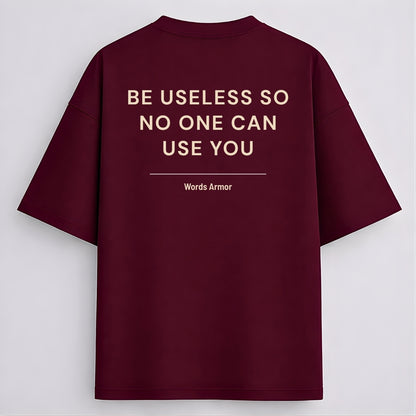 Funny Quote Back Print Oversized T-Shirt Featuring "Be Useless So No One Can Use You" for Men and Women by Words Armor