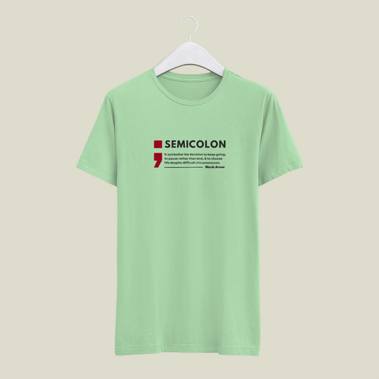 Jade green t-shirt with a red and black graphic and text on a beige background wordsarmor