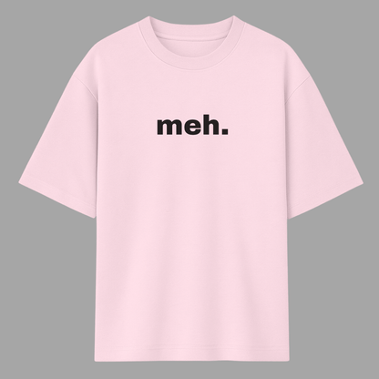 Pink t-shirt with 'meh.' text on a gray background wordsarmor