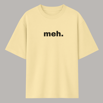 Beige t-shirt with 'meh.' text on a gray background wordsarmor