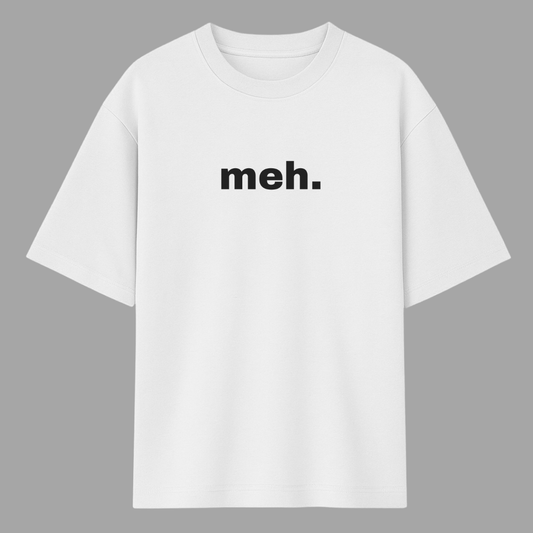 White t-shirt with 'meh.' text on a gray background wordsarmor