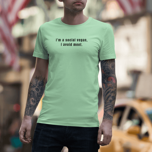 Person wearing a light green t-shirt with text in an urban setting wordsarmor.