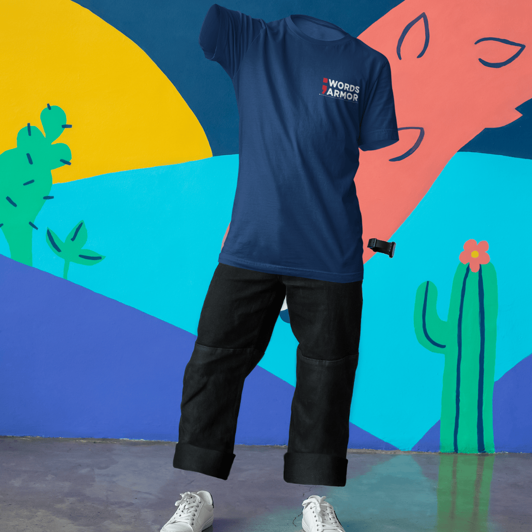 Person wearing a blue t-shirt with a logo against a colorful abstract background wordsarmor