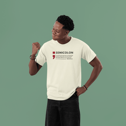 Person wearing a off white t-shirt with 'SEMICOLON' design on a green background wordsarmor