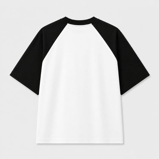 Words Armor Revolution typography oversized white and black raglan T-Shirt for men and women with minimalist streetwear graphic.