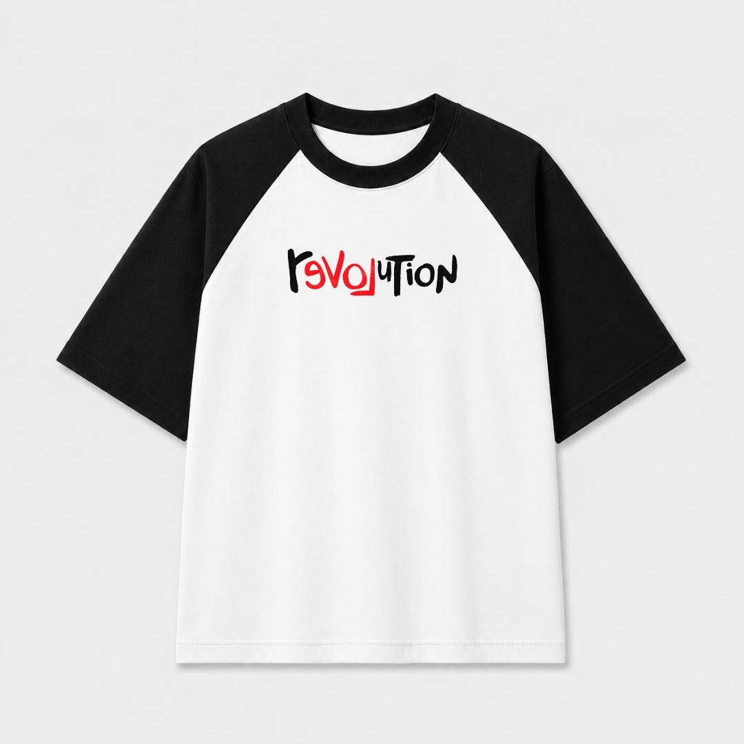 Words Armor Revolution typography oversized white and black raglan T-Shirt for men and women with minimalist streetwear graphic.