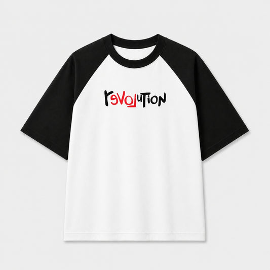 Words Armor Revolution typography oversized white and black raglan T-Shirt for men and women with minimalist streetwear graphic.