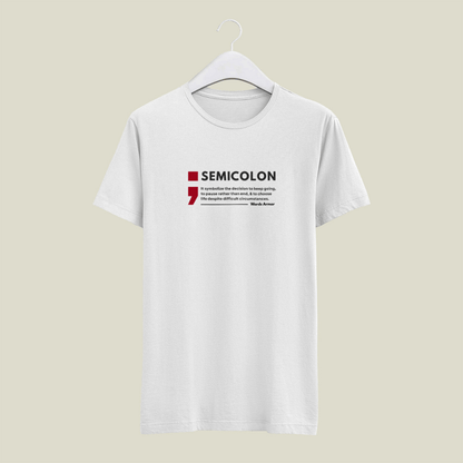 White t-shirt with 'SEMICOLON' design on a beige background wordsarmor