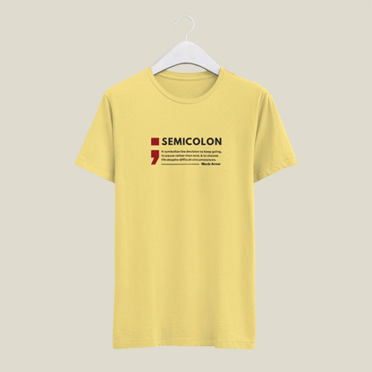 Yellow t-shirt with a semicolon graphic and text on a beige background wordsarmor