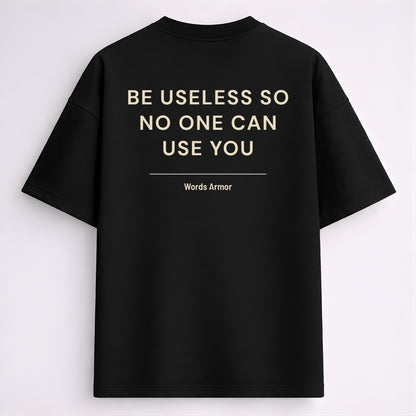 Funny Quote Back Print Oversized T-Shirt Featuring "Be Useless So No One Can Use You" for Men and Women by Words Armor