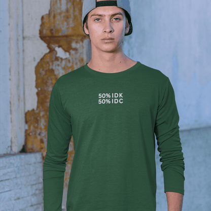 Person wearing a green long-sleeve shirt with text in an urban setting wordsarmor